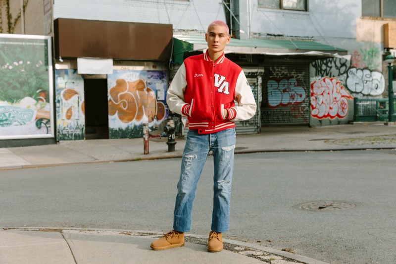 Embracing varsity style, Evan Mock sports UGG's Neumel in Chestnut for the brand's fall-winter 2021 "Feel You" campaign.