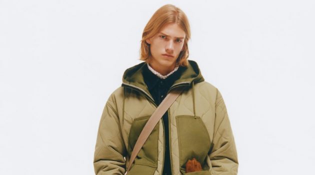 Zara Bundles Up with Workwear-Inspired Numbers Model Martijn Faaij wears a combination puffer jacket with textured cotton pants by Zara.