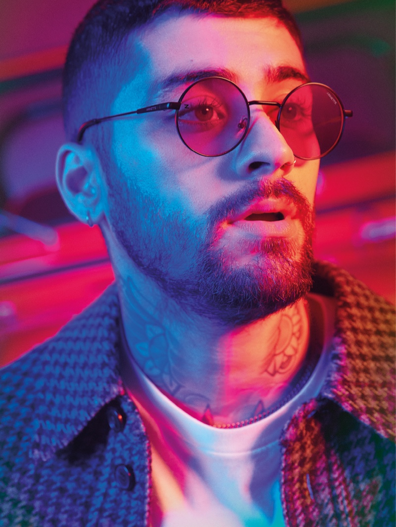 Channeling a psychedelic cool, Zayn rocks his favorite sunglasses from his Arnette eyewear collection, the Drophead.