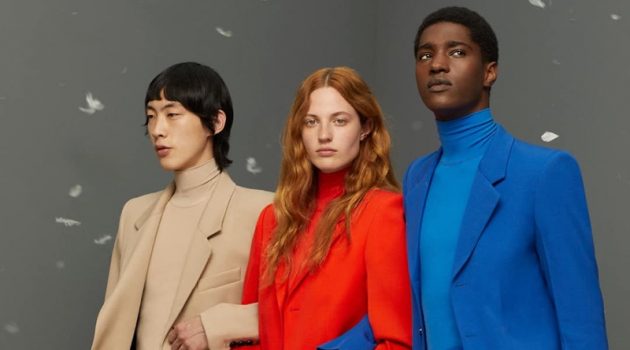 AMI Paris Makes a Sartorial Impact with Colorful Tailoring Linking arms, Tae Meen Kim, Julia Banas, and Diogo Gomes make a colorful statement in AMI Paris.
