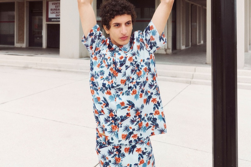 In front and center, Tak Bengana wears a tropical print CO-ORD look from A.P.C.'s spring-summer 2022 collection.