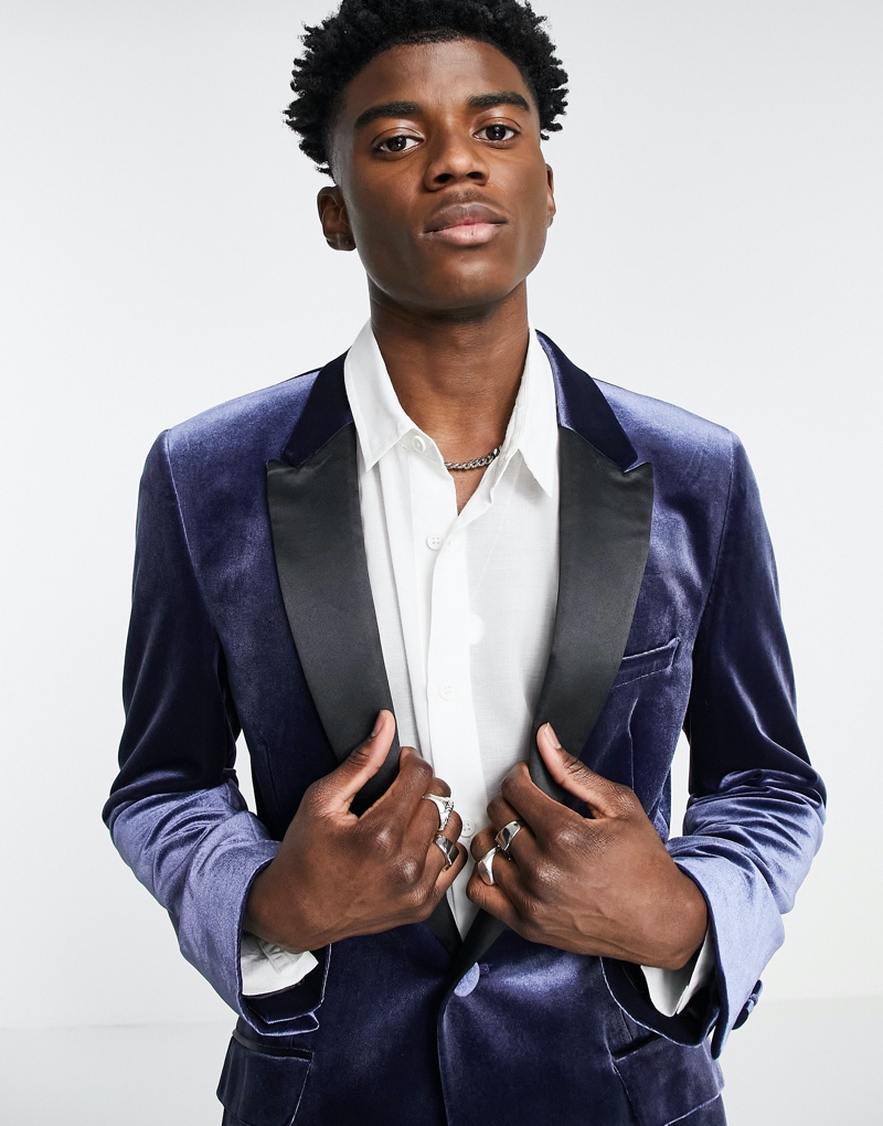 Turn heads like Roncliff here, who's pictured in a super skinny navy velvet suit from ASOS.