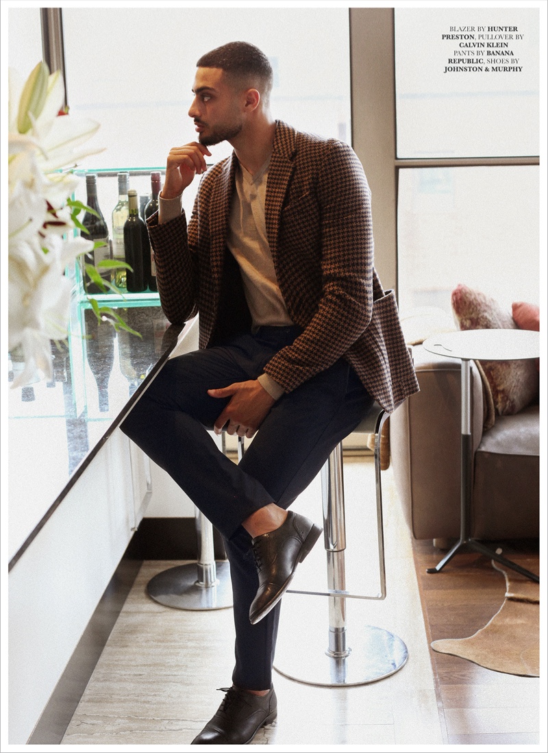 Ali wears blazer Hunter Preston, v-neck sweater Calvin Klein, trousers Banana Republic, and shoes Johnston & Murphy.