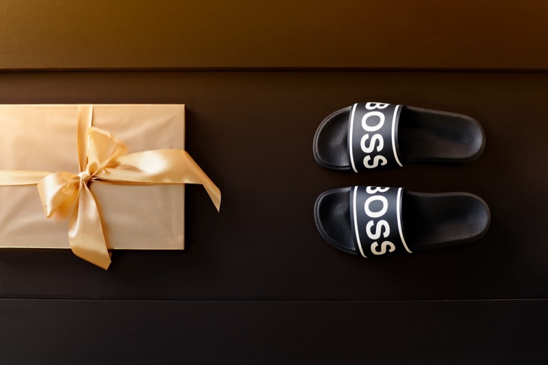 Slide sandals from BOSS are a practical gift idea for the holiday season.