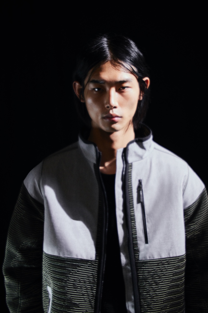 In front and center, Tae Min Park wears a technical jacket from the Mytheresa x BYBORRE capsule collection.