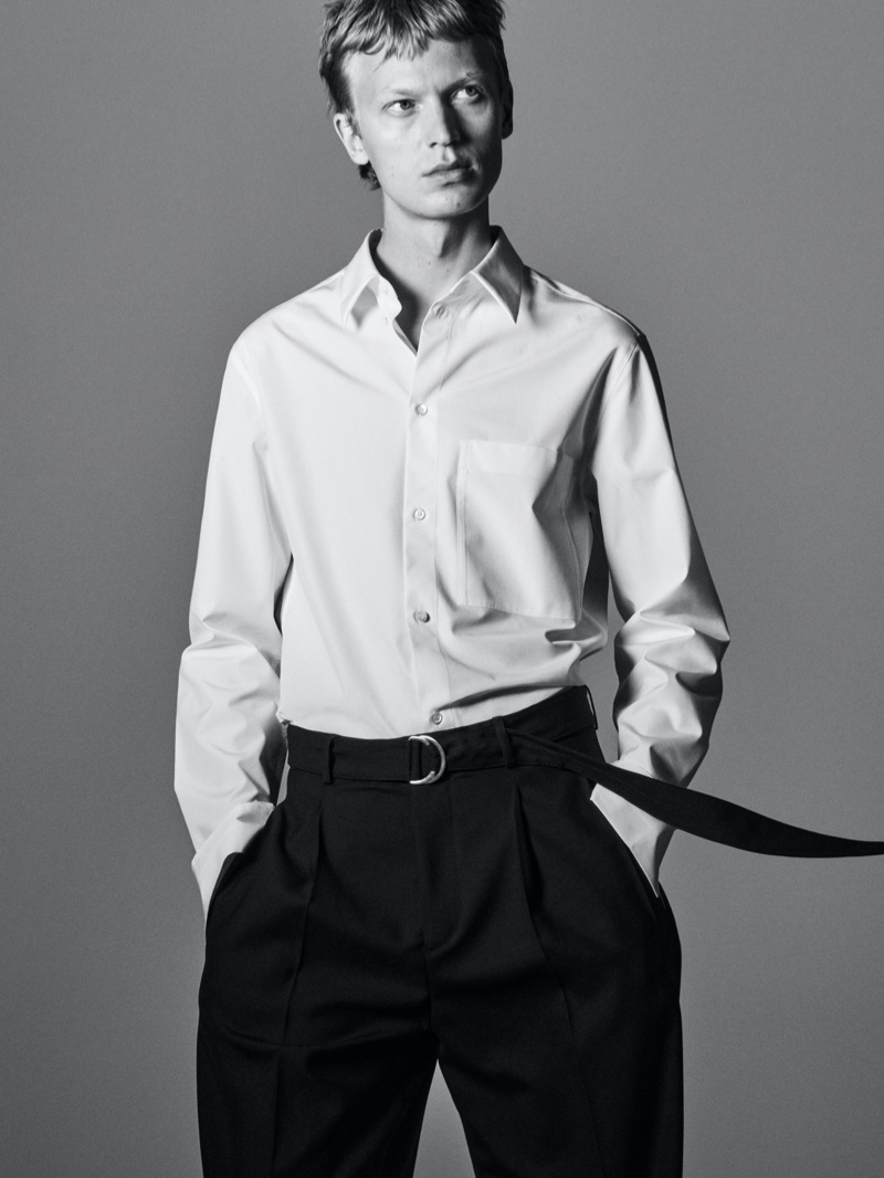 Jonas Glöer dons chic tailoring for COS's holiday 2021 campaign.
