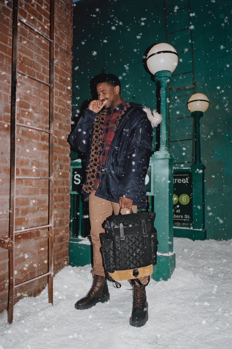 Taking to a snowy New York setting, Michael B Jordan appears in Coach's holiday 2021 campaign.