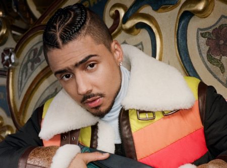 Music artist and actor Quincy fronts Coach's holiday 2021 campaign.