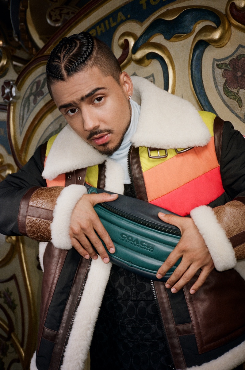 Music artist and actor Quincy fronts Coach's holiday 2021 campaign.