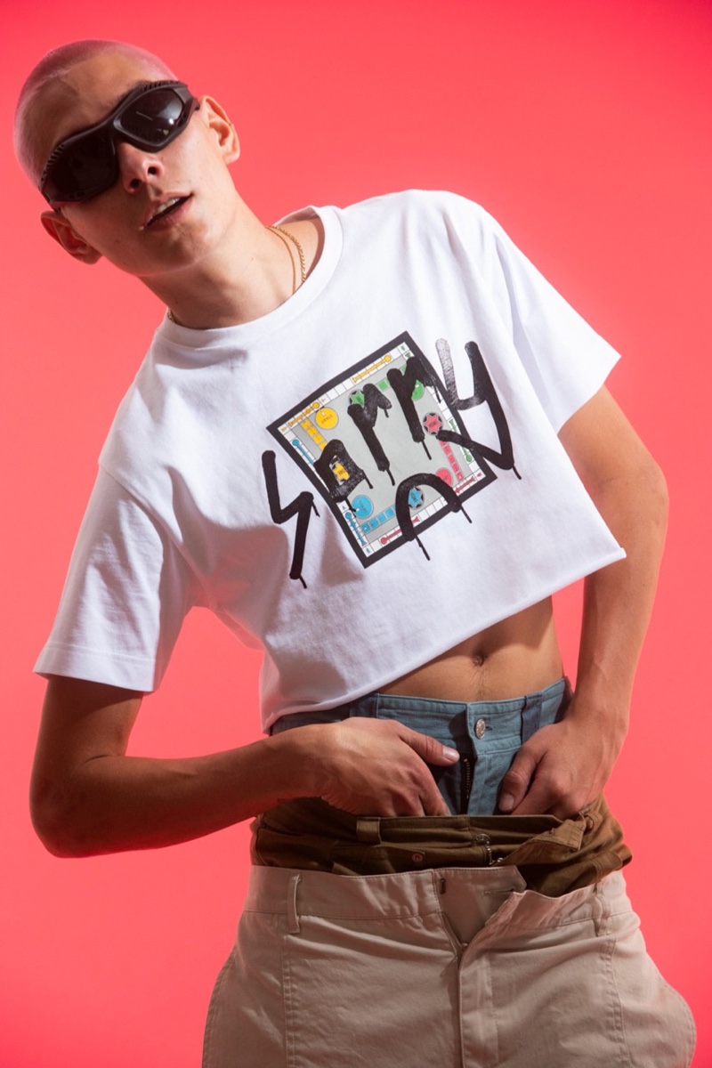 Evan Mock wears a cropped t-shirt from his Sorry in Advance x Giuseppe Zanotti collaboration.