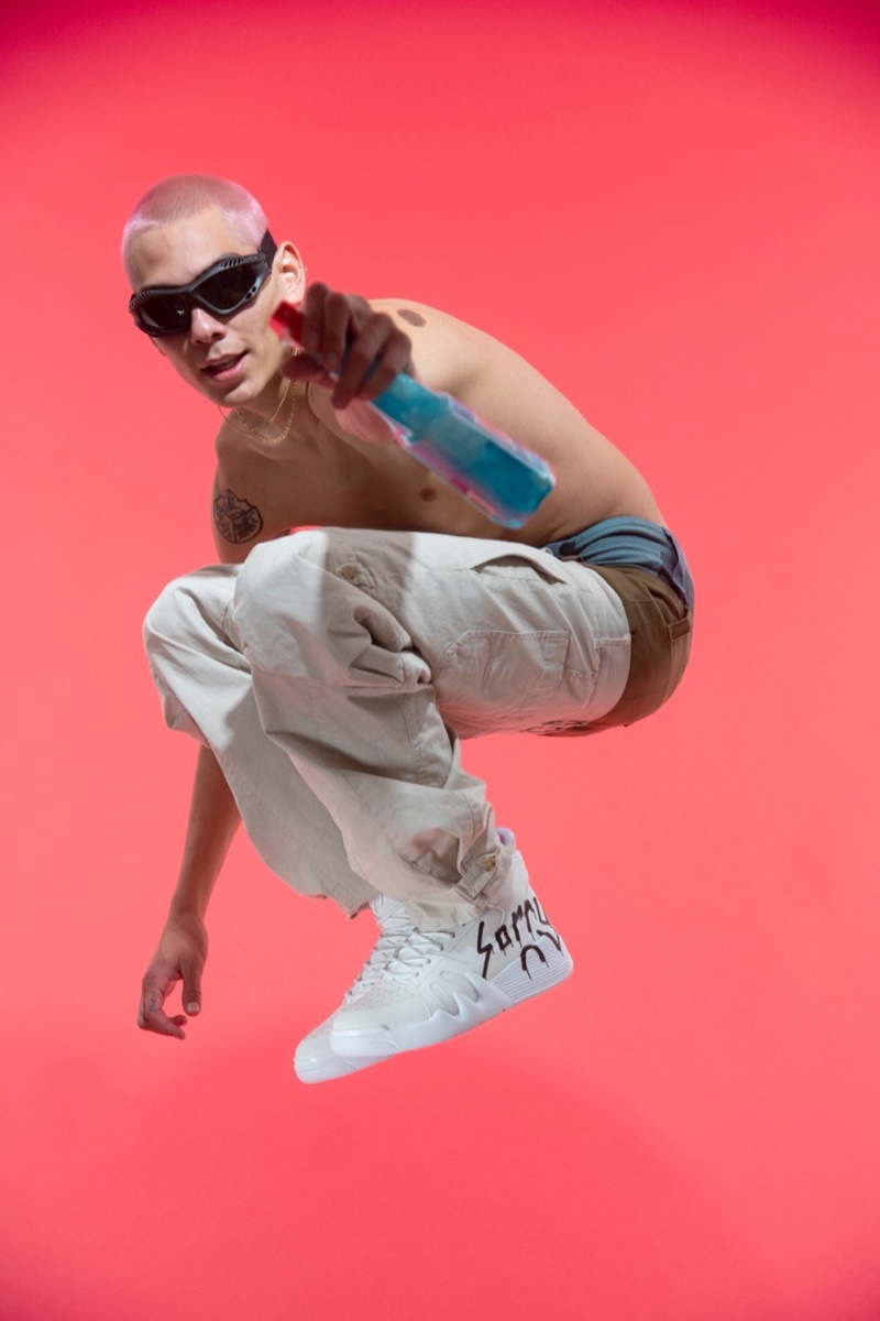 Captured jumping, Evan Mock rocks sneakers from his Sorry in Advance x Giuseppe Zanotti collaboration.