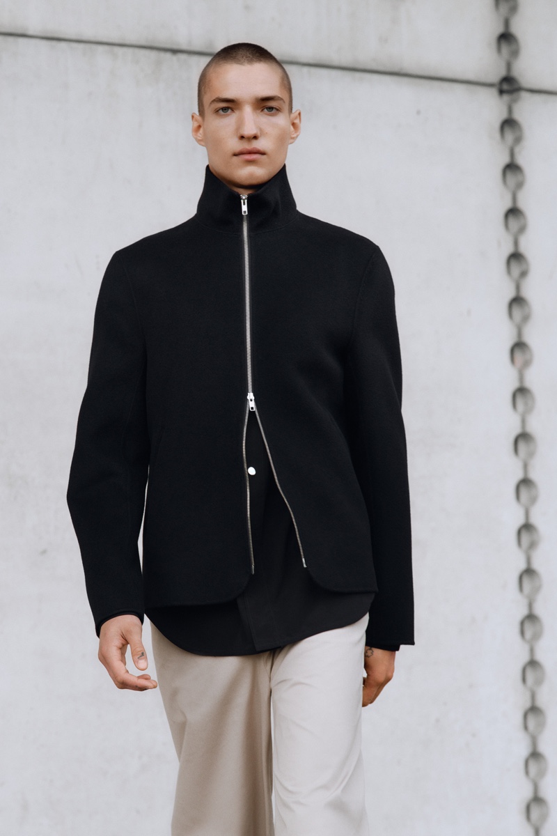 David Shyn wears a full-zip jacket with a nylon overshirt and cotton trousers from Filippa K's spring-summer 2022 men's collection. » A Glimpse at Filippa K's Spring '22 Collection David Shyn wears a full-zip jacket with a nylon overshirt and cotton trousers from Filippa K's spring-summer 2022 men's collection.
