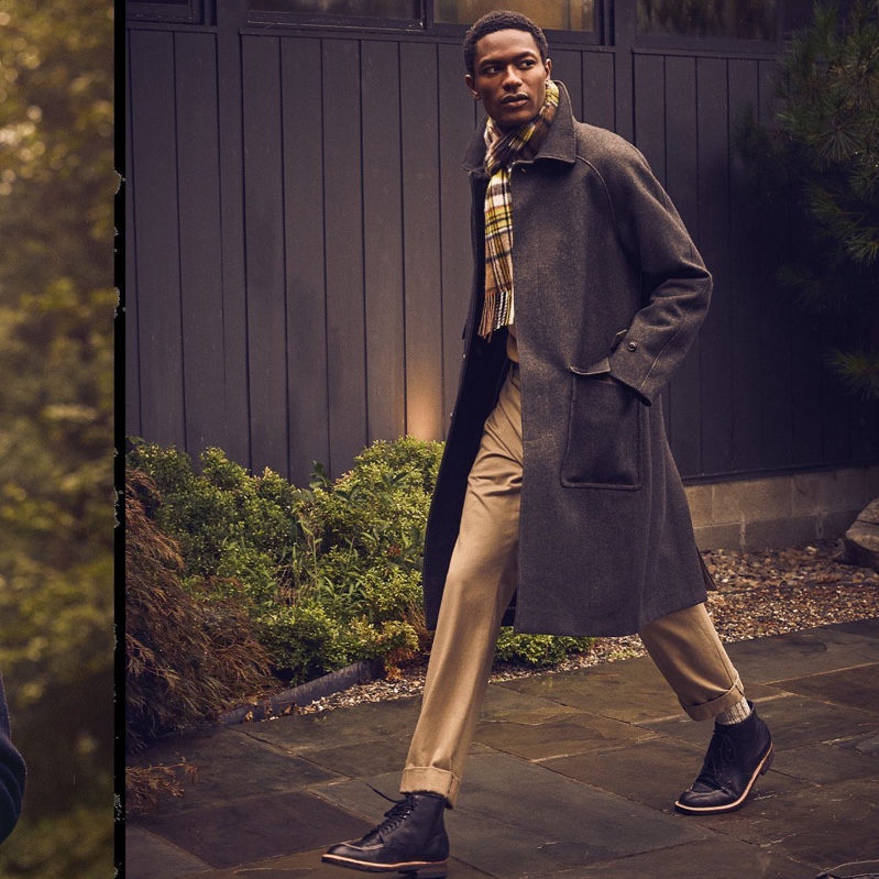 Hamid Onifade wears a Todd Snyder Italian pressed donegal overcoat with straight-fit tab front stretch chinos, Alden Indy boots, and a Joshua Ellis cashmere tweed scarf.