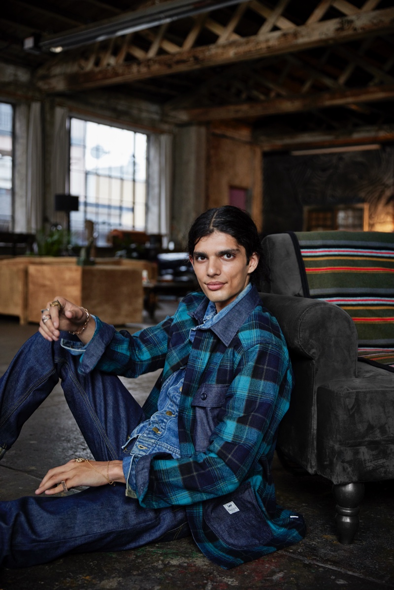 Model Karim Turk wears a flannel shirt and denim pieces from the Lee x Pendleton collection.