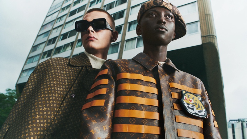 Models Lucas Dermont and Djily Kamara sport clothing and accessories from the Louis Vuitton x NIGO collection.