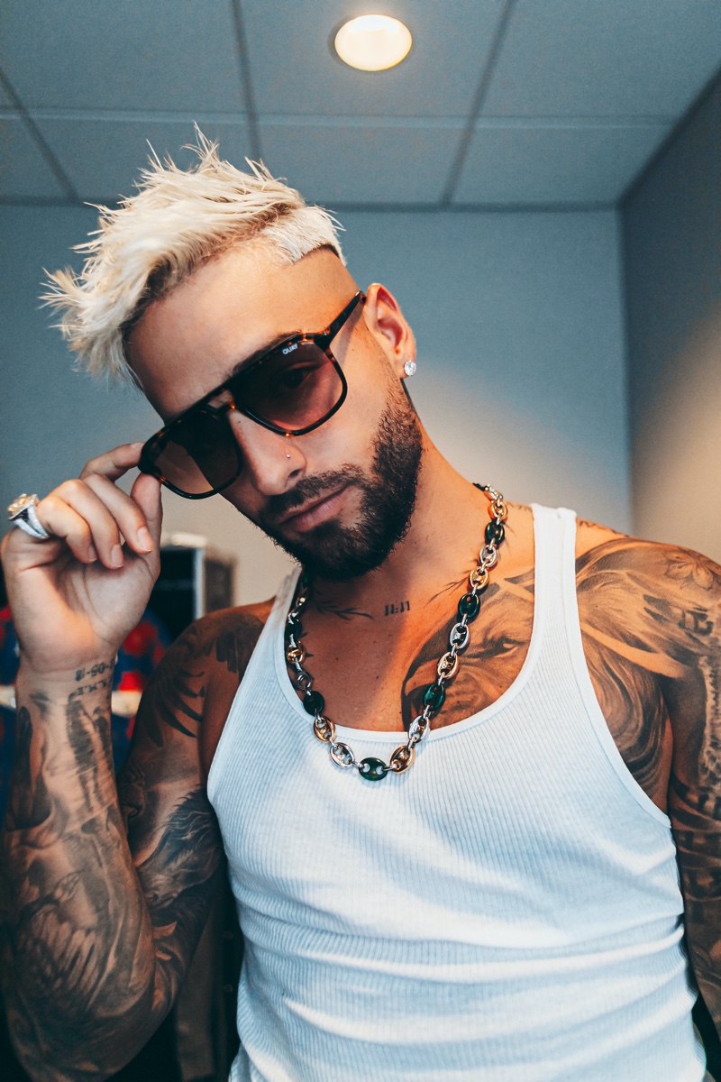Reuniting with Quay, Maluma sports an update on the brand's On the Fly sunglasses.