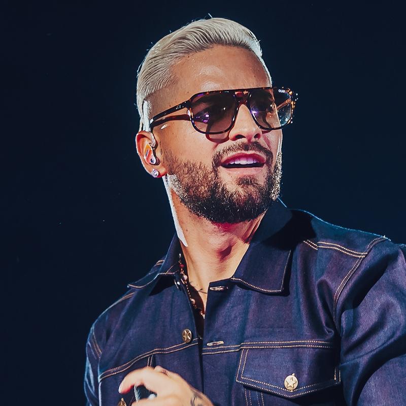 Music artist Maluma rocks On the Fly sunglasses from his Quay collaboration.