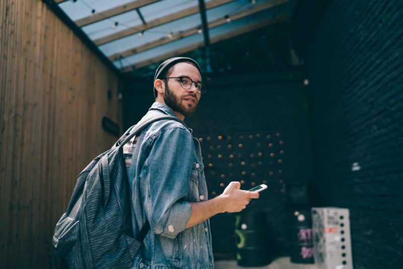 Man Wearing Oversized Denim Jacket Glasses Beanie