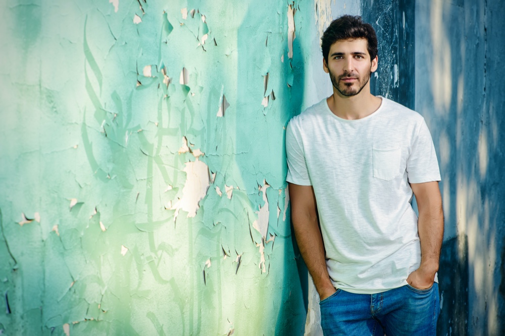 Man Wearing T-shirt and Jeans