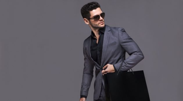 Jobs 3.0: The Rise of the Personal Shopper Man in Suit Sunglasses with Shopping Bag