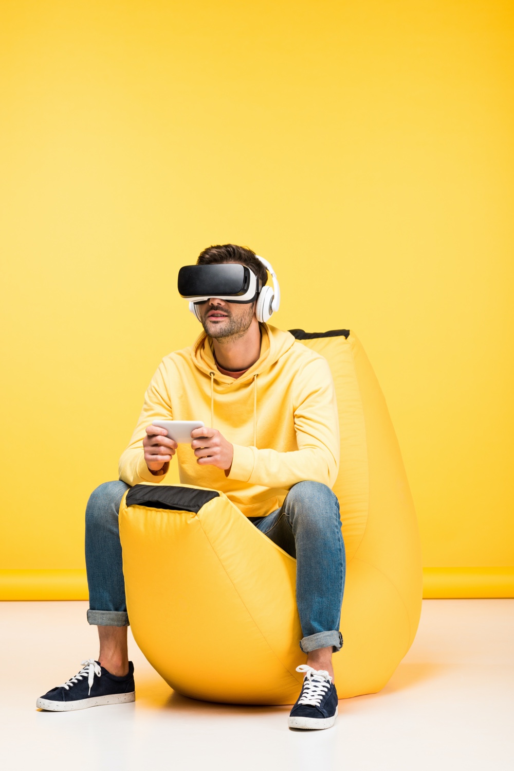 Man in Yellow Virtual Reality Banana Bean Bag Chair Video Games