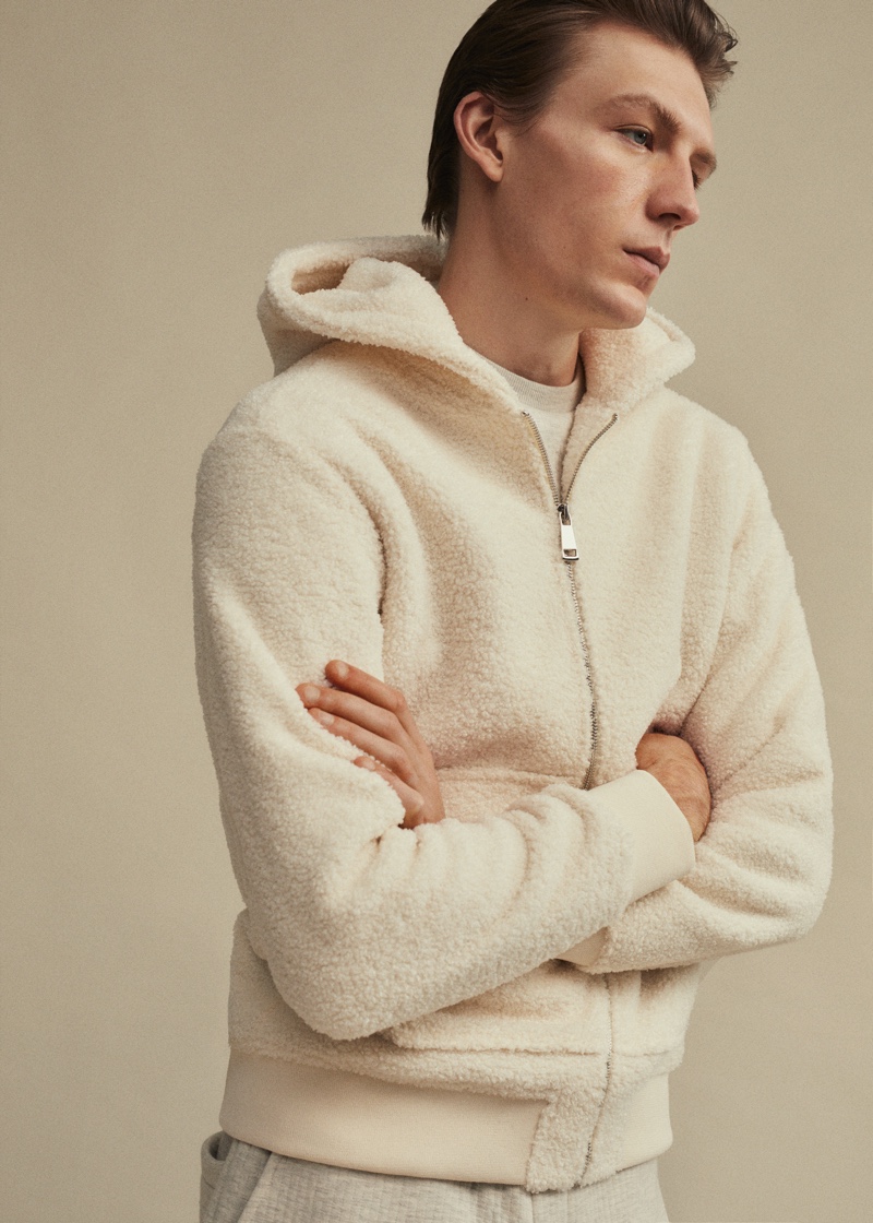 Making a case for comfort, Finnlay Davis stays warm in Mango's shearling pajama sweatshirt.