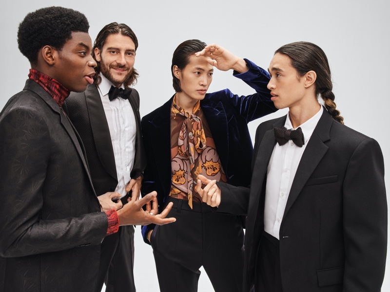 Donning formal holiday looks, four models participate in Mytheresa's 2021 festive campaign: Cedric Sanvee; Florent Megdoud; Ungho Go; and Robin (The Fashion Composers).