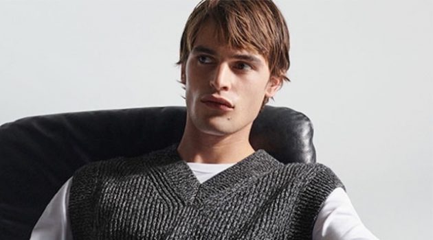 Embracing smart style, Parker van Noord wears a ribbed sweater vest from COS.