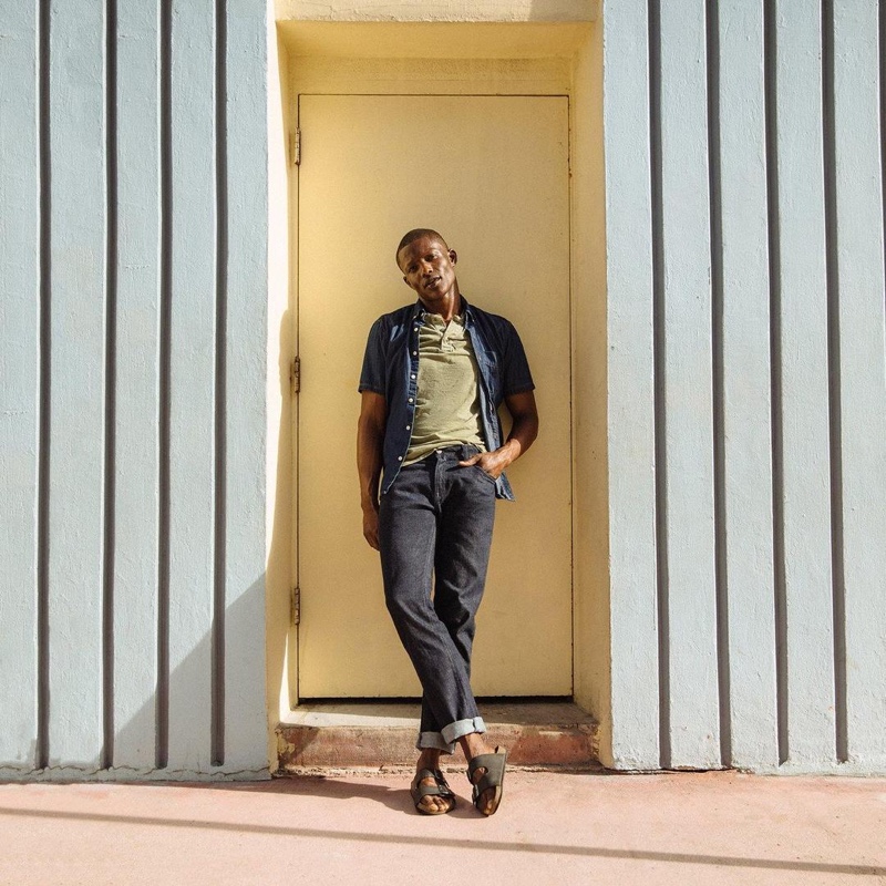 Festus Amarteifio steps out in a pair of Peluro's dark wash denim jeans.