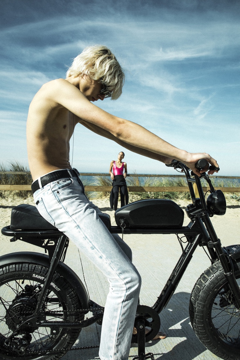 Model Rocco Segers gets on the back of a limited-edition Saint Laurent SUPER73-S2 bike for the French fashion house's Rive Droite line.