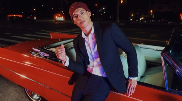 Alexis, Matthew, RJ + More Get in the Holiday Spirit with Tommy Hilfiger Alexis Chaparro poses next to a convertible as the star of Tommy Hilfiger's holiday 2021 campaign.
