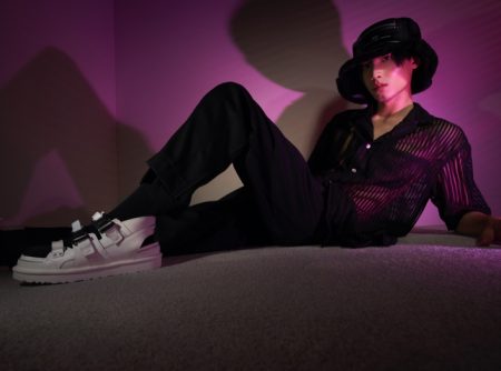 Taking up the spotlight, Ritter Shi fronts the UGG x Feng Chen Wang fall-winter 2021 campaign, modeling a bucket hat with sandals.