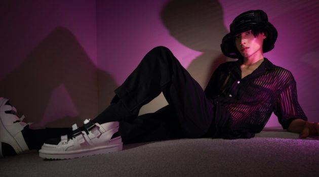 Taking up the spotlight, Ritter Shi fronts the UGG x Feng Chen Wang fall-winter 2021 campaign, modeling a bucket hat with sandals.
