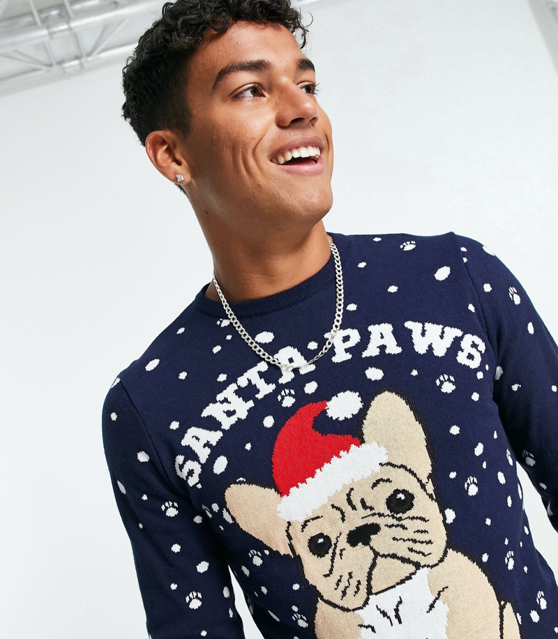 Marlow Depeza wears ASOS Design's Santa Paws Christmas sweater with a French bulldog design.