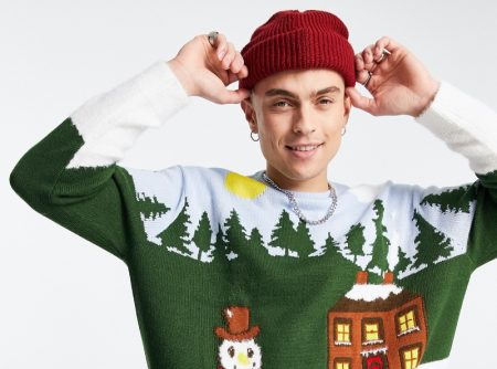 Joel Mignott charms in a Christmas sweater from ASOS.