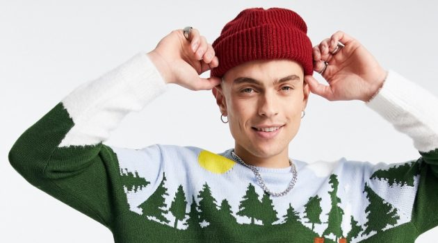 It's Not Too Late for Your Ugly Christmas Sweater Joel Mignott charms in a Christmas sweater from ASOS.