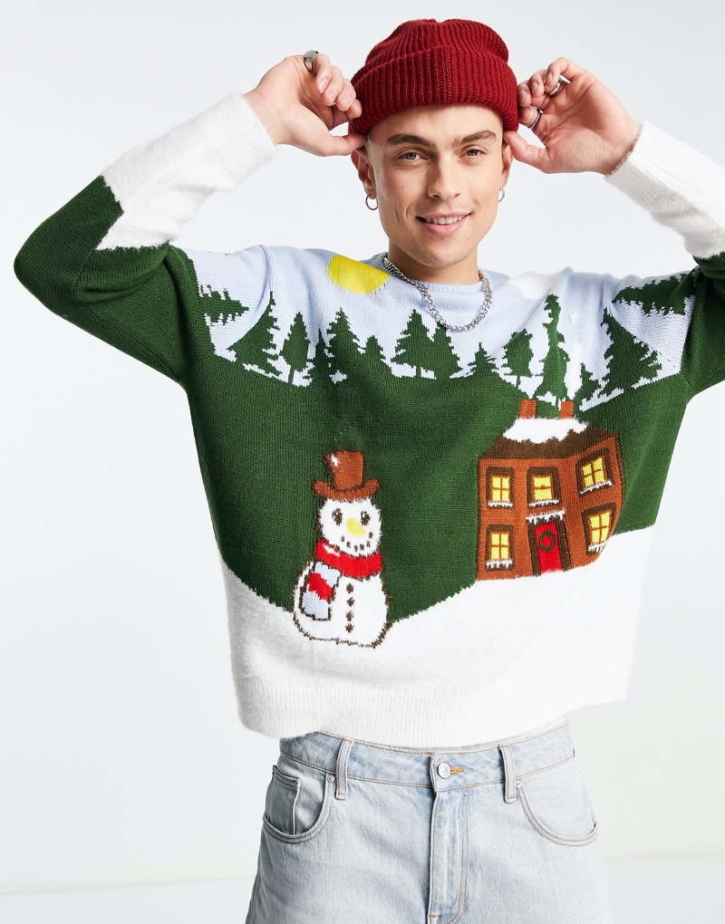 Joel Mignott charms in a Christmas sweater from ASOS.