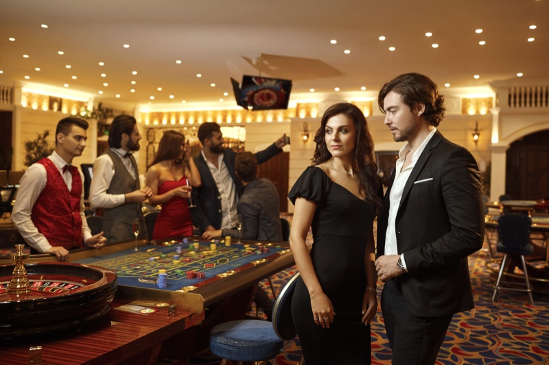 Attractive Couple Vegas Casino Man Suit Woman Black Dress