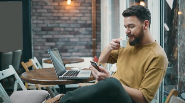 How to Find Great Deals and Save Money When Shopping Online Attractive Man Cafe Checking Phone Laptop