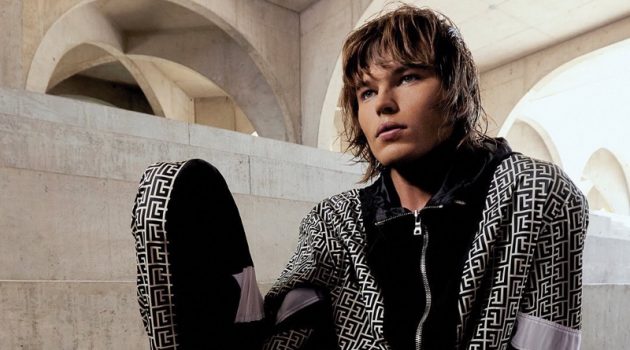 Jordan Barrett Fronts Balmain Paris Hair Couture Campaign Jordan Barrett sports a black and white tracksuit as the star of the Balmain Paris Hair Couture fall-winter 2021 campaign.