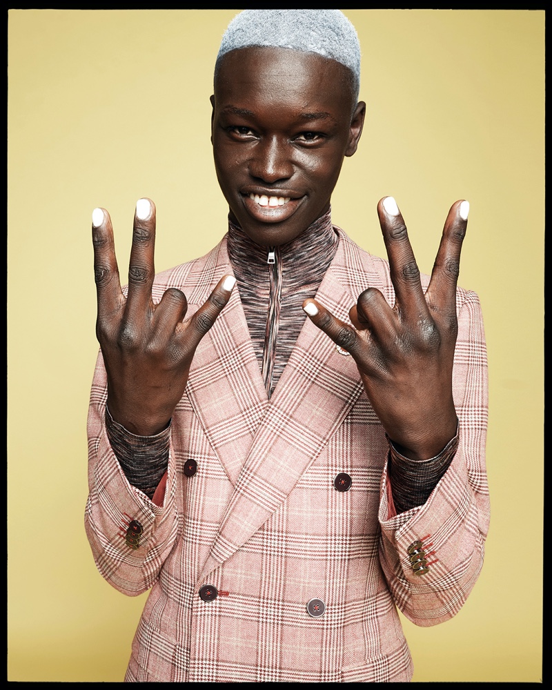 Cheikh Diakhate rocks a check double-breasted suit from Dolce & Gabbana's spring-summer 2022 Magnificent collection.