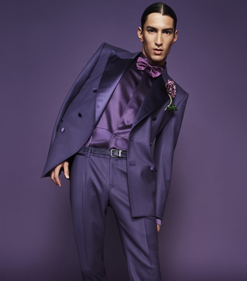 Nicolas Rios Riascos stands out in Dolce & Gabbana's purple double-breasted stretch wool Sicilia-fit suit with a silk satin Martini-fit tuxedo shirt.