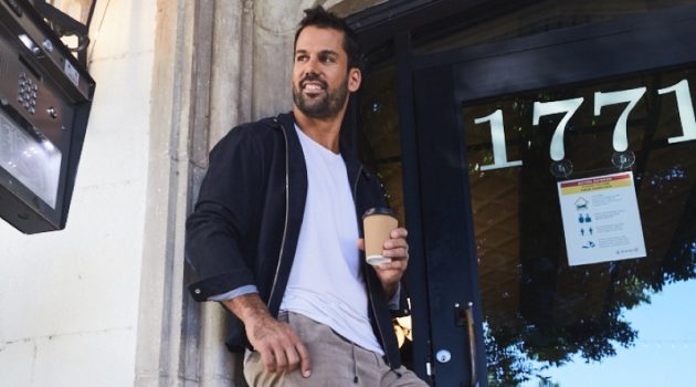 All smiles, Eric Decker wears New Balance 997H sneakers for DSW.
