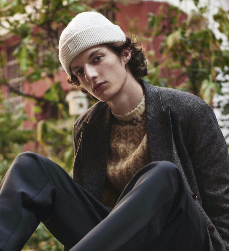 When it comes to winter, don't lose your head! Here, Hugo Gillain wears a Lemaire knitted wool beanie for Mytheresa.