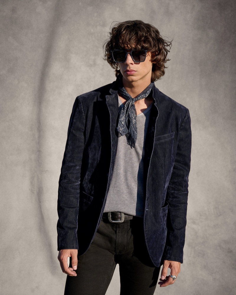 Griffin Reed wears a slim-fit jacket and matchstick skinny jeans from John Varvatos.
