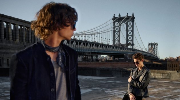 Urban Indigos: John Varvatos Looks to Manhattan Skyline for Inspiration Models Griffin Reed and Trevor Willis showcase looks from John Varvatos' resort 2022 collection.