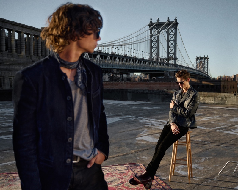 Models Griffin Reed and Trevor Willis showcase looks from John Varvatos' resort 2022 collection.
