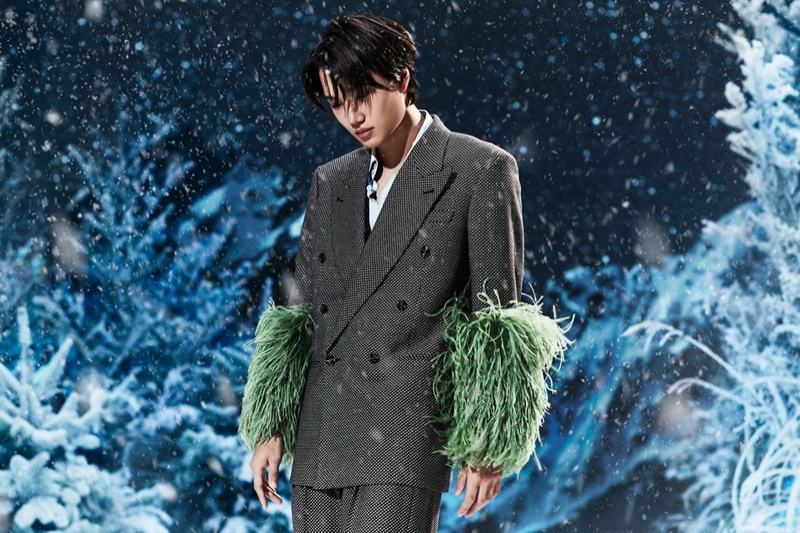 Photographed against a winterscape, Kai stars in the Gucci Aria holiday 2021 campaign.