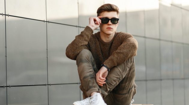 Male Model Neutral Sweater Camo Pants Sitting