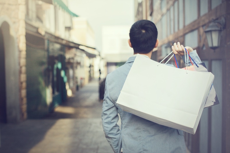Man Holding Shopping Bag Man Holding Shopping Bag